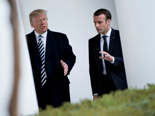 US President Donald Trump (L) and France's President Emmanuel Macron walk to the West Wing