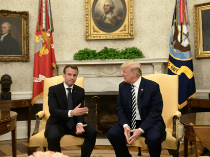 US President Donald Trump (R) and French President Emmanuel Macron speak to the media in the Oval Office at the White House in Washington, DC, on April 24, 2018. (Photo by Brendan Smialowski / AFP) (Photo credit should read BRENDAN SMIALOWSKI/AFP/Getty Images)