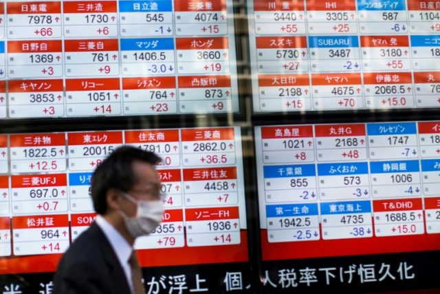 Tokyo drives Asia stocks higher in light holiday trade