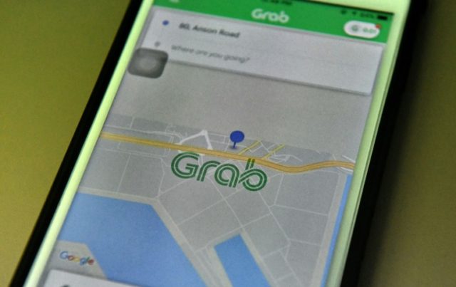 Singapore says Uber-Grab deal may flout competition rules