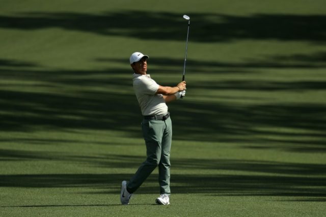 Top-form McIlroy grabs for Masters win, career Grand Slam
