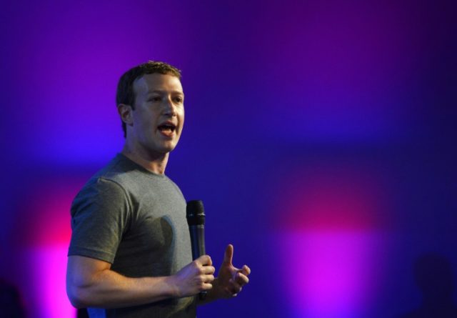 Amid growing firestorm, Facebook's Zuckerberg sets Congress date