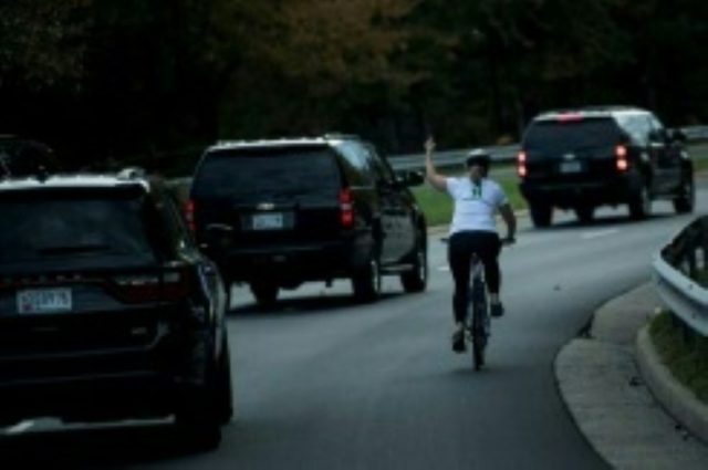 Cyclist fired for showing Trump middle finger sues ex-employer