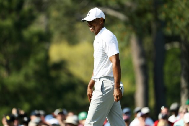 Tiger Woods tees off in 82nd Masters