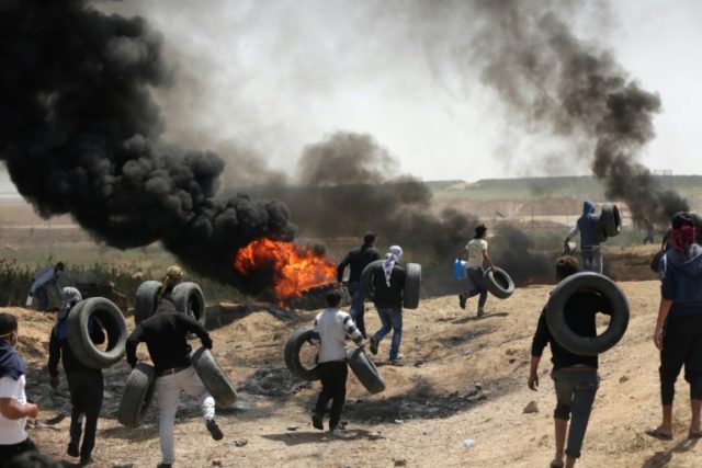 Clashes erupt as protests begin along Gaza border