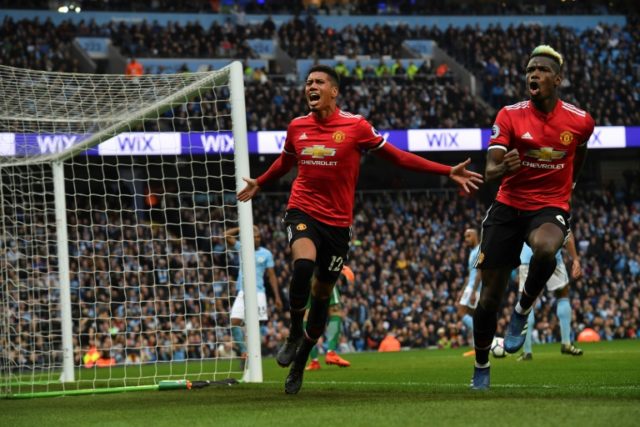 Pogba leads thrilling Man Utd comeback to keep City waiting for title