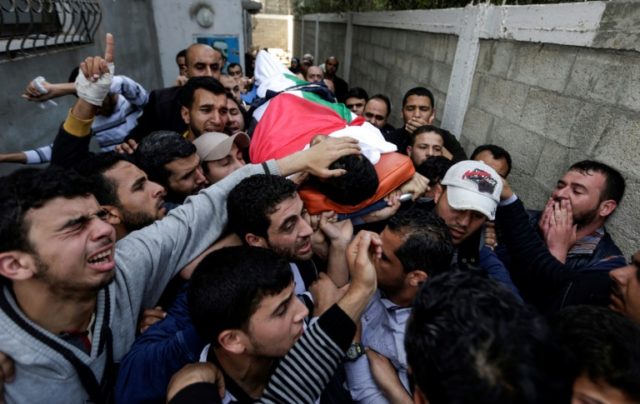 Press vest on chest, Gaza buries journalist killed by Israeli fire