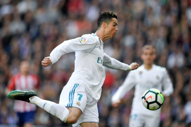 Ronaldo continues goal spree but Real held by stubborn Atletico