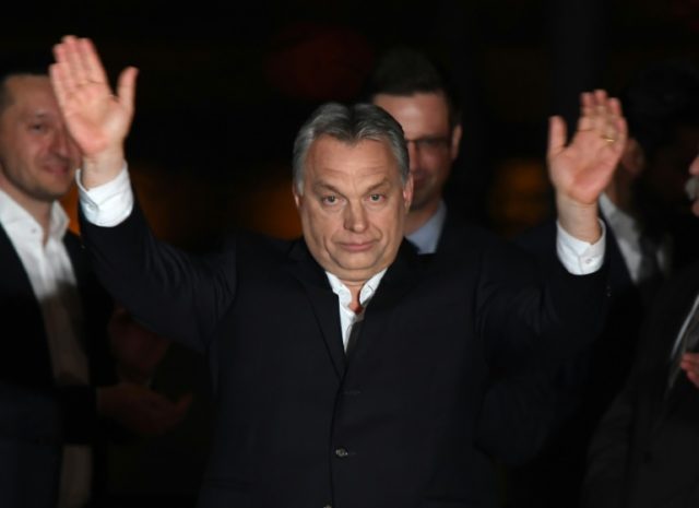 Hungary anti-immigration PM Orban basks in election glory