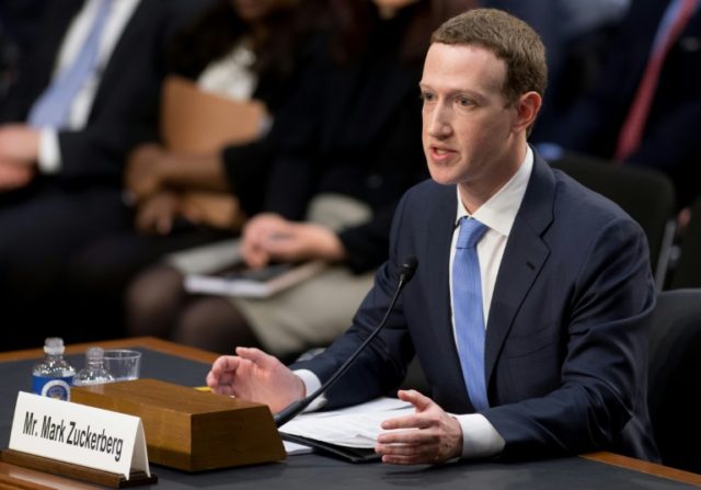 Contrite Zuckerberg says Facebook in 'arms race' with Russia