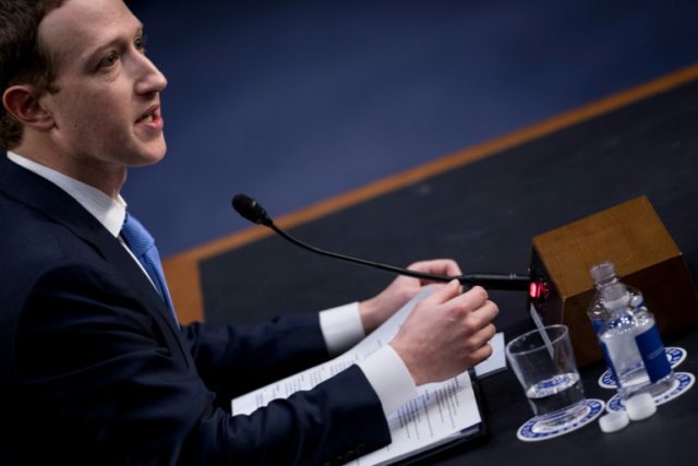 Contrite Zuckerberg says Facebook in 'arms race' with Russia