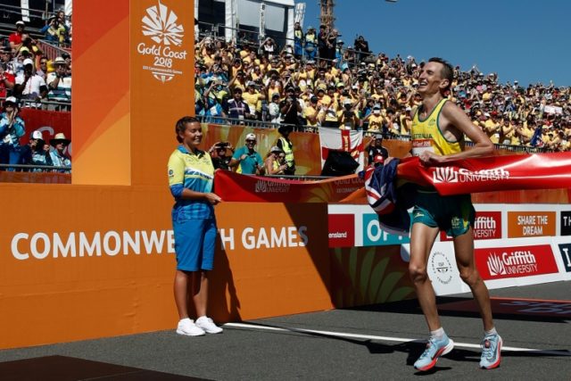 Dramatic collapse overshadows Commonwealth Games marathon