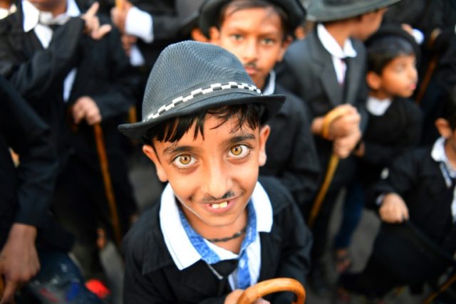 The Great Impersonators: Charlie Chaplin fans parade through Indian town