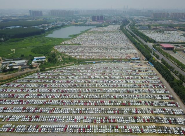 China to lift foreign ownership limits on automakers