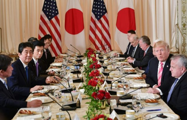 Trump issues public challenge to Abe on trade