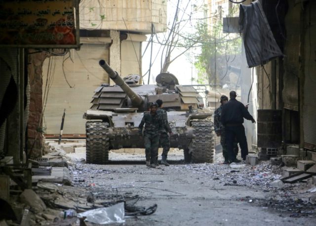 Syria regime forces shell Damascus jihadist bastion