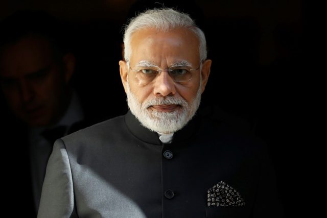 Modi faces protests as he signs £1bn deal on UK trip