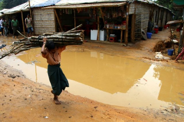Fears for Rohingya as first rains flood Bangladesh camps