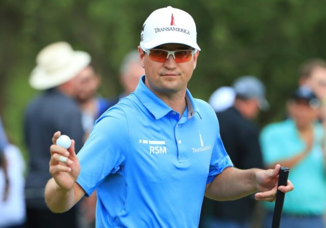 Johnson birdies 18 to grab share of PGA Texas Open lead