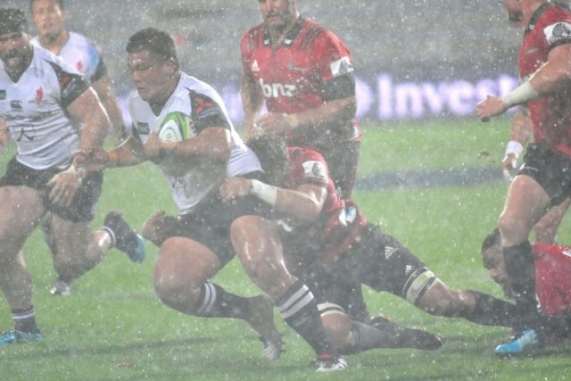 Crusaders hold off spirited Sunwolves in stormy weather