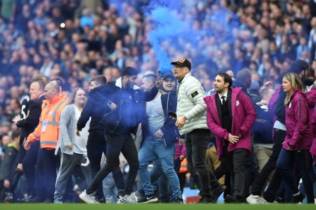 Guardiola unconcerned by celebratory Man City pitch invasion