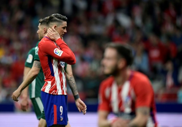 Atletico draw to leave Barcelona even closer to title