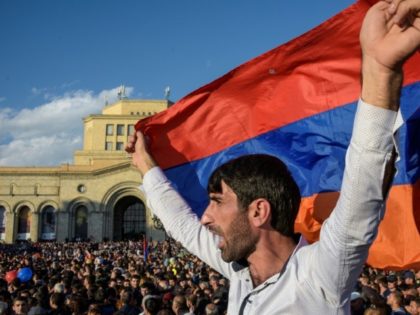 Armenia celebrates as veteran leader quits amid protests