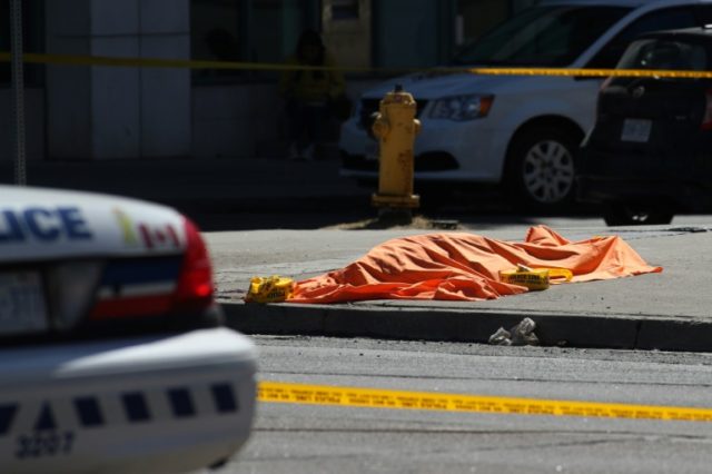 Van plows into Toronto crowd in 'deliberate' act, leaving 10 dead