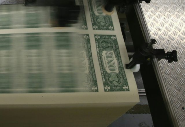 Dollar rises in Asia with Treasury yields, Japan exporters rally