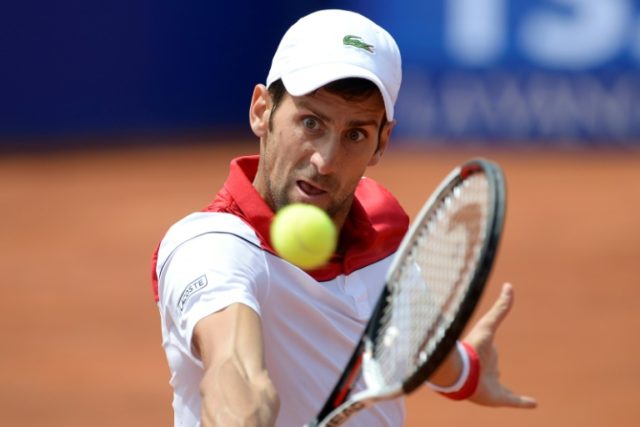 Djokovic in surprise Barcelona defeat, no sweat for Nadal