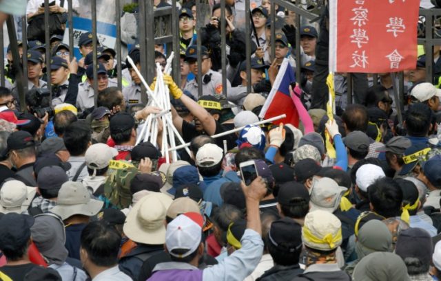 Taiwan veterans clash with police in pension protest