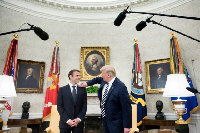 Trump wipes dandruff off visiting French President Macron