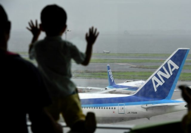 Profits at Japan's ANA soar as rival JAL sinks further