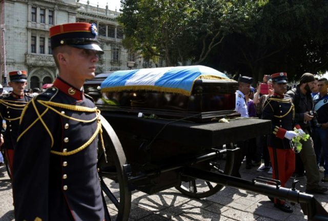 Thousands pay tribute as Guatemala's ex-president buried