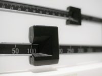 Overweight Kids Diabetes This Tuesday, April 3, 2018 photo shows a closeup of a beam scale in New York. New research released on Wednesday, April 4, 2018 suggests there's a critical window for overweight kids to get to a healthy level. Those who shed their extra pounds by age 13 had the same risk of developing diabetes in adulthood as others who had never weighed too much, a large study of Danish men found. (AP Photo/Patrick Sison) The Associated Press