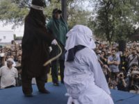 Indonesia Caning A Shariah law official whips a woman who is convicted of prostitution during a public caning outside a mosque in Banda Aceh, Indonesia, Friday, April 20, 2018. Indonesia's deeply conservative Aceh province on Friday caned several unmarried couples for showing affection in public and two women for prostitution before an …