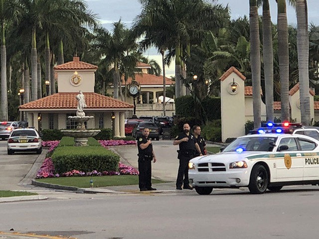 Police respond to The Trump National Doral resort after reports of a shooting inside the resort Friday, May 18, 2018 in Doral, Fla. A man shouting about Donald Trump entered the president's south Florida golf course early Friday, draped a flag over a lobby counter and exchanged fire with police …