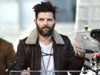 Actor Adam Scott speaks onstage at 2018 Women's March Los Angeles at Pershing Square on January 20, 2018 in Los Angeles, California. (Photo by Amanda Edwards/Getty Images for The Women's March Los Angeles)