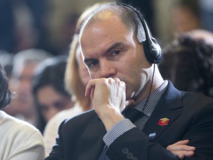 Saudis Afghanistan - Deputy National Security Adviser For Strategic Communications Ben Rhodes, right, and National Security Adviser Susan Rice, use headphones to listen to the translation of Argentinian President Mauricio Macri remarks during their joint news conference with President Barack Obama at the Casa Rosada in Buenos Aires, Argentina, Wednesday, …