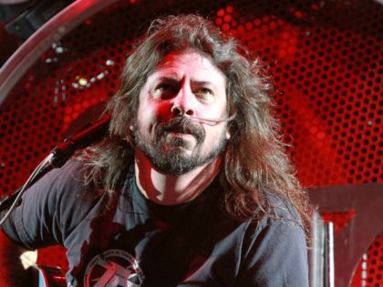 Dave Grohl with Foo Fighters performs at Centennial Olympic Park on Sunday, October 4, 2015, in Atlanta. (Photo by Robb D. Cohen/Invision/AP)