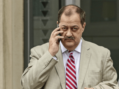 In this Tuesday, Dec. 1, 2015, file photo, former Massey Energy CEO Don Blankenship, left, makes his way out of the Robert C. Byrd U.S. Courthouse during a break in deliberations, in Charleston, W. Va. Blankenship is finishing up his one-year federal prison sentence related to the deadliest U.S. mine …
