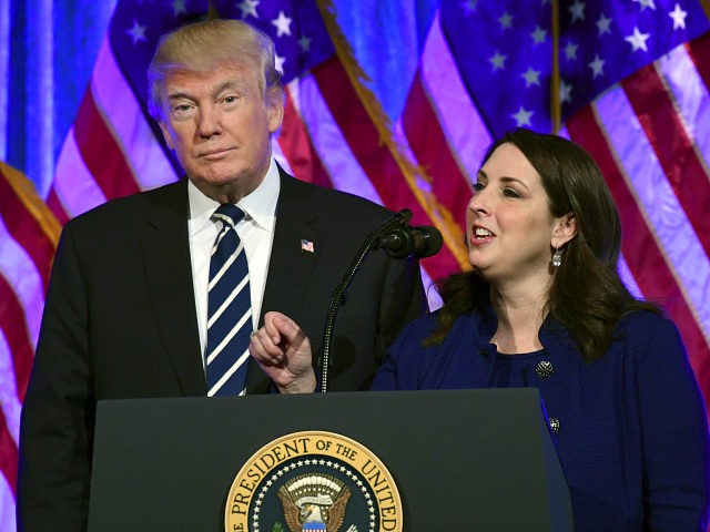 President Donald Trump, left, listens as Republican National Committee chairwoman Ronna Ro