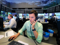 FRANKFURT AM MAIN, GERMANY - JUNE 24: A trader looks to his computer screens whilst working at the Frankfurt Stock exchange the day after a majority of the British public voted for leaving the European Union on June 24, 2016 in Frankfurt am Main, Germany. Many prominent corporate CEOs and …