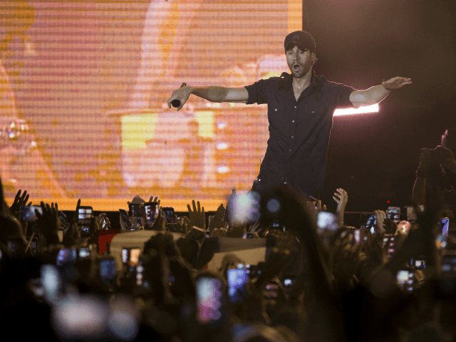 Spanish singer Enrique Iglesias performs on stage in Tel Aviv, Israel, Sunday, May 27, 201