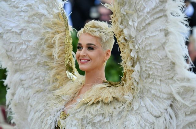 Katy Perry arrives for the 2018 Met Gala on May 7, 2018, at the Metropolitan Museum of Art in New York. - The Gala raises money for the Metropolitan Museum of Arts Costume Institute. The Gala's 2018 theme is Heavenly Bodies: Fashion and the Catholic Imagination. (Photo by Angela WEISS …