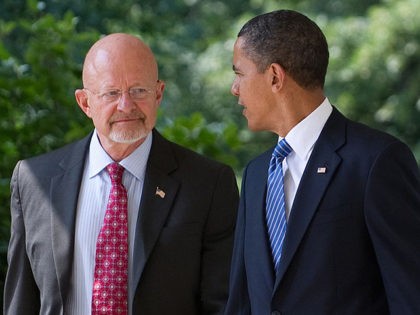 US President Barack Obama walks down the West Wing Colonnade alongside retired General Jam