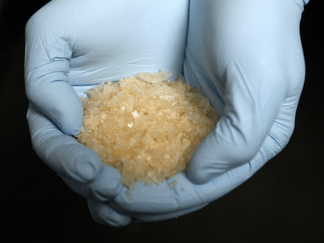 Parts of 4 kilograms confiscated crystal meth drug is displayed to journalists during a press conference at the German federal police headquarters in Wiesbaden, western Germany, on November 13, 2014 after German and Czech polices arrested 15 people in crystal meth raids in and near the German eastern city of …