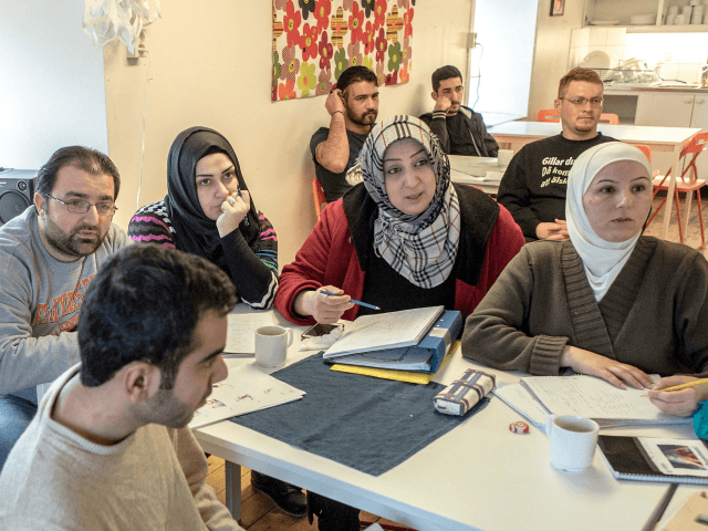 KLADESHOLMEN, SWEDEN - FEBRUARY 10: Refugees attend to Swedish language class at the tempo