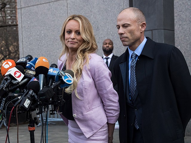 NEW YORK, NY - APRIL 16: (L to R) Adult film actress Stormy Daniels (Stephanie Clifford) and Michael Avenatti, attorney for Stormy Daniels, speak to the media as they exit the United States District Court Southern District of New York for a hearing related to Michael Cohen, President Trump's longtime personal attorney and confidante, April 16, 2018 in New York City. Cohen and lawyers representing President Trump are asking the court to block Justice Department officials from reading documents and materials related to Cohen's relationship with President Trump that they believe should be protected by attorney-client privilege. Officials with the FBI, armed with a search warrant, raided Cohen's office and two private residences last week. (Photo by Drew Angerer/Getty Images)