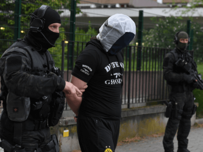 French policemen arrest a man in Strasbourg on May 13, 2018, suspected to be related to a